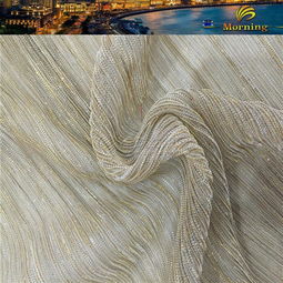 舞臺(tái)魅力與禮服華彩 全滌針織幻燈絲壓皺亮絲網(wǎng)布的時(shí)尚之旅